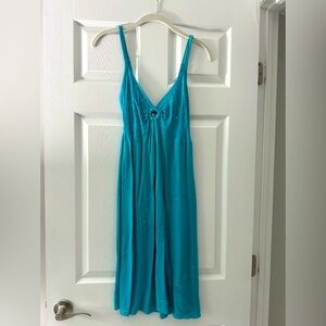 Blue dress. Strappy. V neck. Flattering for any waistline. Stretchy. Not tight.